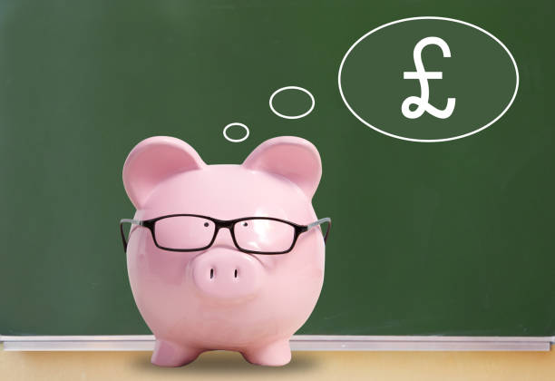 istock Pig bank and pound sterling 1033742996