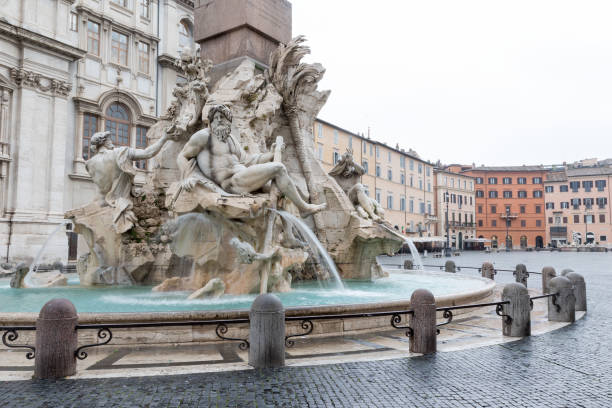 istock Fountain of the Four Rivers in the empty Piazza Navona 1033743030
