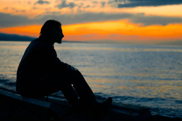 Young woman look ahead - horizontal silhouette of a side view