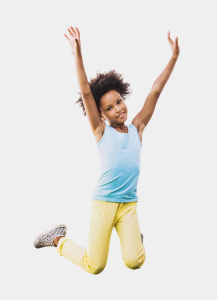 istock Beautiful little kid girl jumping 1033753400