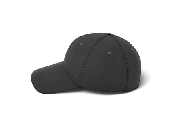 istock 3d rendering of a single black baseball cap with black stitching lying on a white background. 1033766082