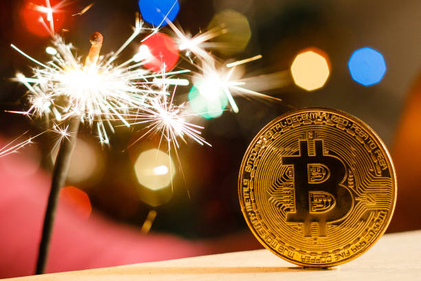 bitcoin oro navidad luces de bengala - stock exchange flash fotografías e imágenes de stock