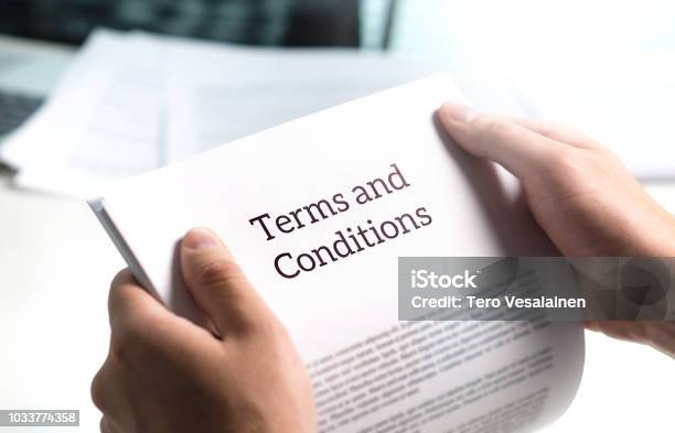 Terms And Conditions Text In Legal Agreement Or Document About Service Insurance Or Loan Policy Stock Photo - Download Image Now