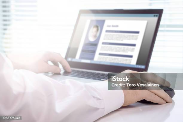 Job Seeker And Applicant Writing His Resume And Cv With Laptop Modern And Visual Electronic Curriculum Vitae In Social Media Work Experience Document In Computer Screen Stock Photo - Download Image Now
