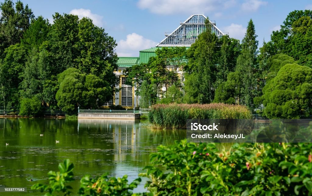 landscape. Park with pond and greenhouse Horizontal Stock Photo