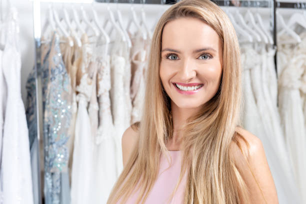 istock Bridal shop & smiling woman 1033786088