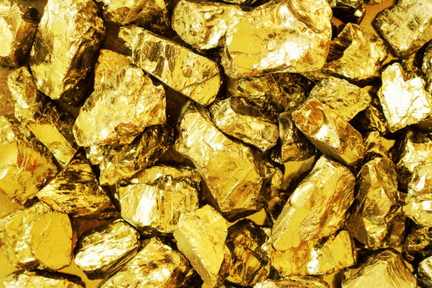 istock Golden bars with soft focus and shiny surface close up 1033786794
