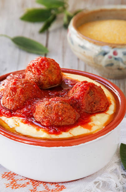 Meatballs With Creamy Polenta And Marinara stock photo