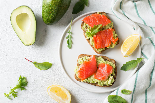 istock Toasts with avocado and salmon on plate 1033795140
