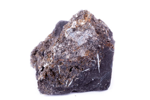 istock Macro mineral stone ilmenite on a white background close up 1033796150