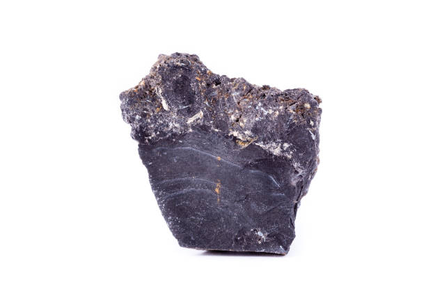 istock Macro mineral stone ilmenite on a white background close up 1033796160