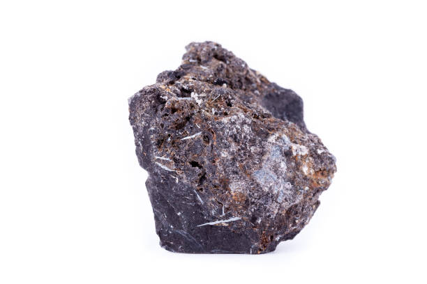 istock Macro mineral stone ilmenite on a white background close up 1033796170