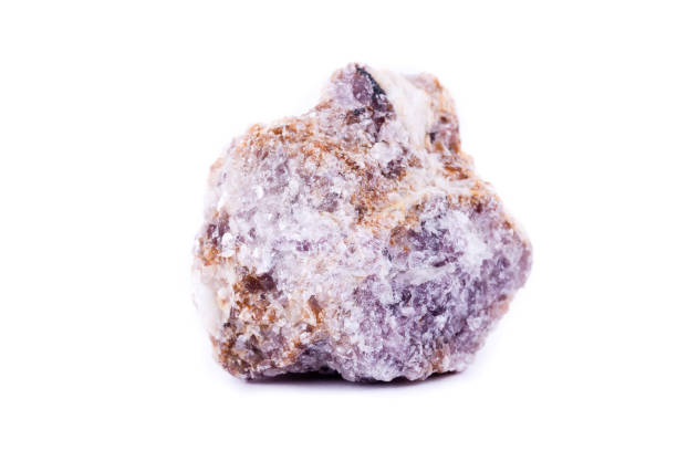istock macro mineral stone lepidolite on a white background close up 1033799256