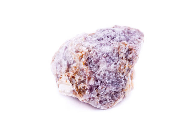 istock macro mineral stone lepidolite on a white background close up 1033799266