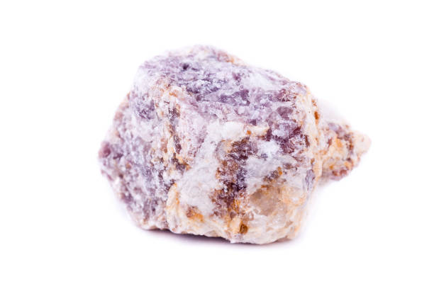istock macro mineral stone lepidolite on a white background close up 1033799274
