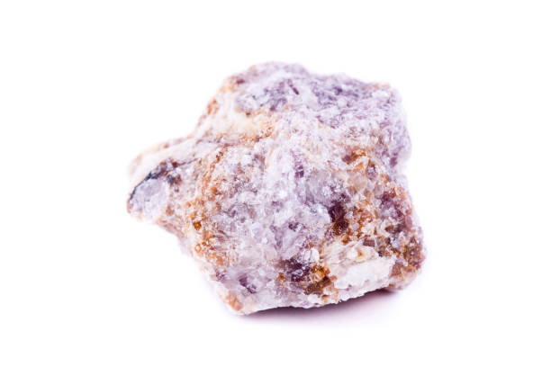 istock macro mineral stone lepidolite on a white background close up 1033799306