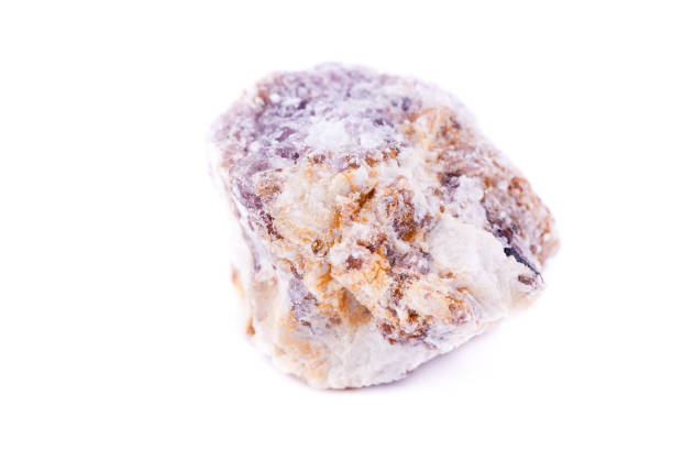 istock macro mineral stone lepidolite on a white background close up 1033799318