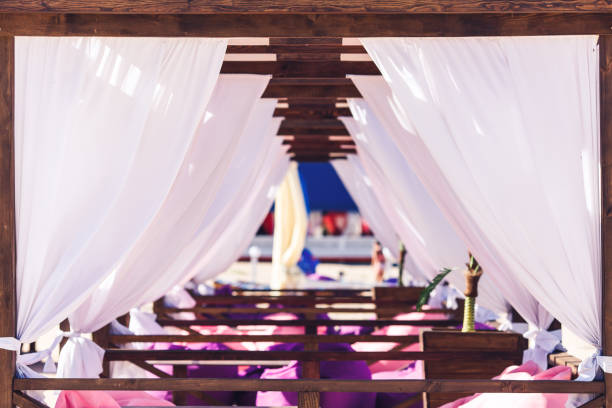 istock beautiful summer cafe with white curtains. 1033802270