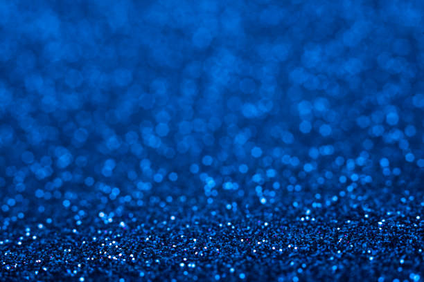 istock Shiny blue abstract christmas background. Blue glitter. 1033802470