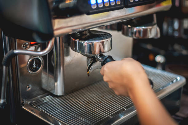 istock Barista preparing to make coffee in coffee shop 1033813764