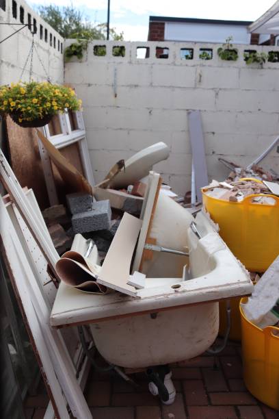 istock Bathroom renovation project old bathroom closet items placed on the front yard 1033819866