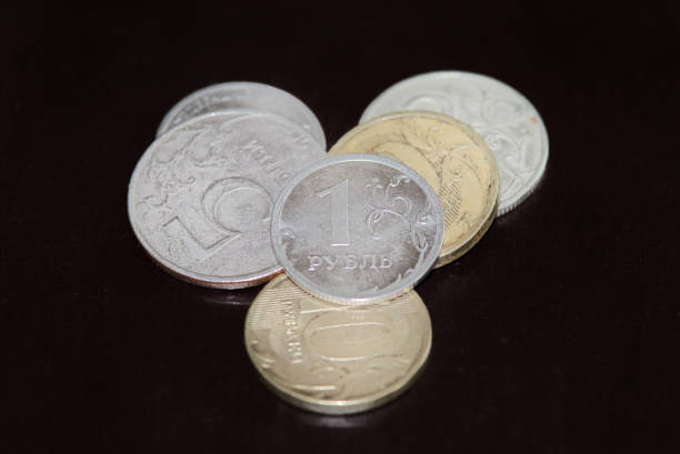 istock Pile of Russian coins on black background 1033823590