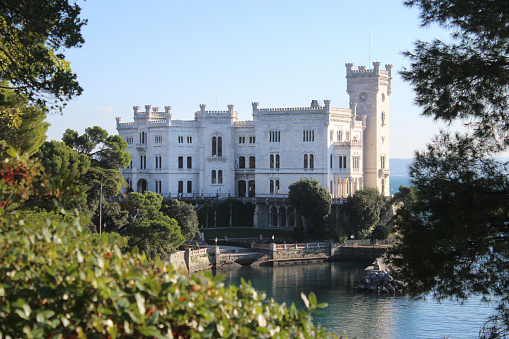 Miramare Castle (Italian: Castello di Miramare; German: Schloss Miramar; Slovene: Grad Miramar) is a 19th century castle on the Gulf of Trieste near Trieste, Italy. It was built from 1856 to 1860 for Austrian Archduke Ferdinand Maximilian and his wife, Charlotte of Belgium, later Emperor Maximilian I and Empress Carlota of Mexico, based on a design by Carl Junker.