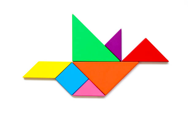 Color wood tangram puzzle in flying bird shape on white background