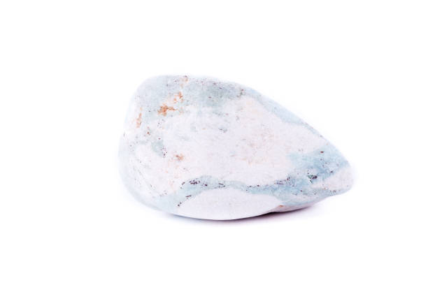 istock macro mineral stone  aniolite (Aniol) on a white background close up 1033827142
