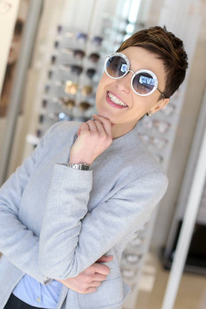 istock Woman trying new sunglasses 1033830010