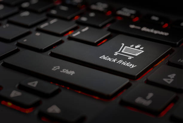black friday keyboard Black keyboard with black friday eshopping icon on the enter key, detail enter key photos stock pictures, royalty-free photos & images