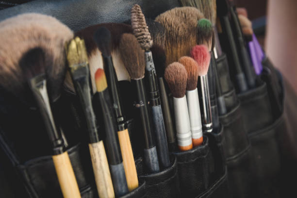 istock Close up view on black packet of paintbrushes 1033838946