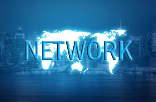 istock Network text on world map and blurred city background 1033846294
