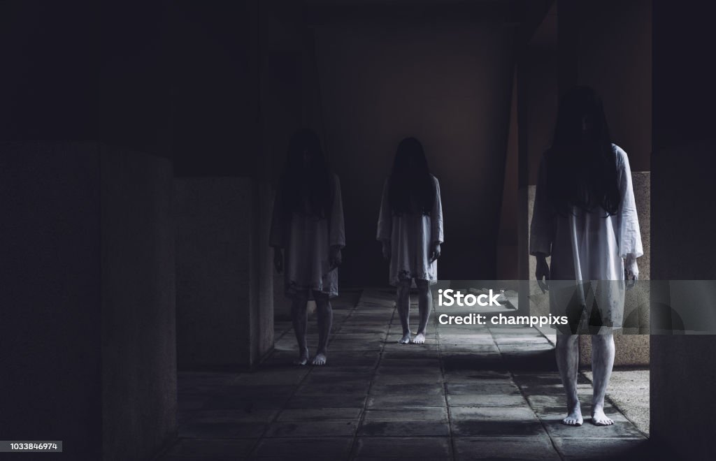 Horror scene of ghost woman death movie halloween festival in the dark house nightmare screaming on hell is monster devil girl or female dead characters at night evil dressing wraith spirit theme. Spooky Stock Photo