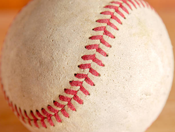 istock Sports Equipment old Baseball background texture 1033854292