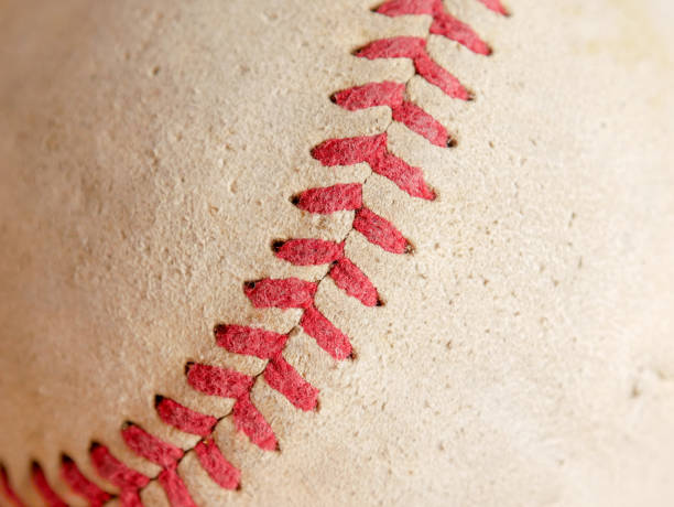istock Sports Equipment old Baseball background texture 1033854358