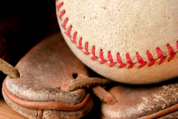 istock Sports Equipment old Baseball background texture 1033855872