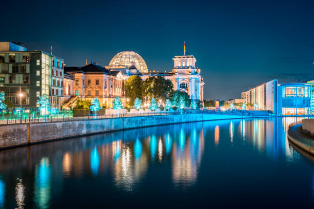 istock Berlin government district with Spree river at twilight, central Berlin Mitte, Germany 1033886632