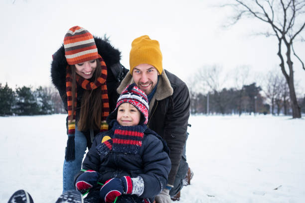 istock Young family enjoying winter 1033890206