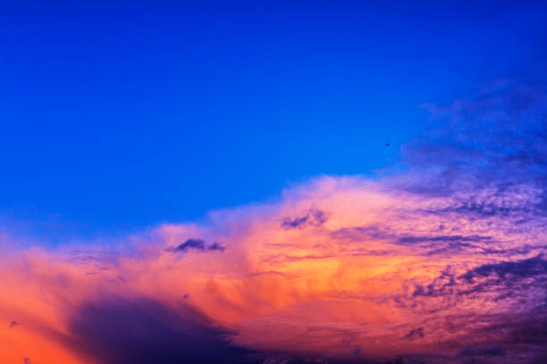 istock Jet Airliner Flying Above Extreme Weather Dark Sunset Cloudscape 1033890294