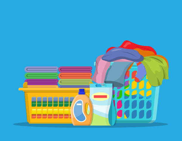 Laundry linen or clothes in baskets Laundry linen or clothes in baskets and detergent. cleaning or washing service concept. Vector illustration in flat style bedding illustrations stock illustrations