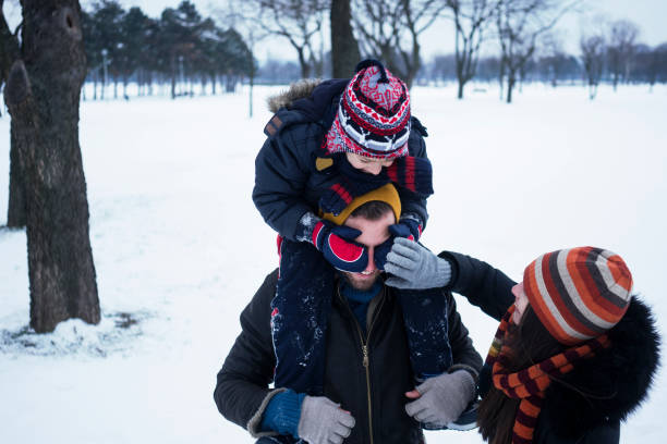 istock Young family enjoying winter 1033893452