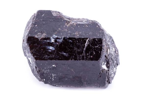 istock macro mineral stone schorl on a white background close up 1033921082