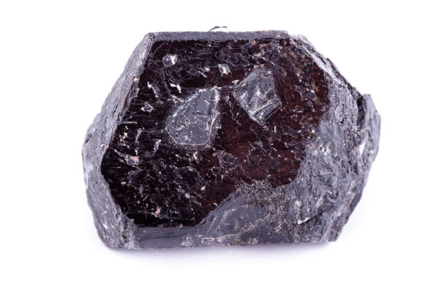 istock macro mineral stone schorl on a white background close up 1033921090