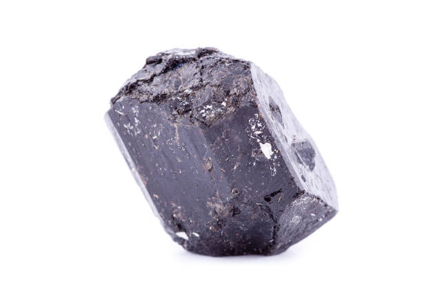 istock macro mineral stone schorl on a white background close up 1033921112