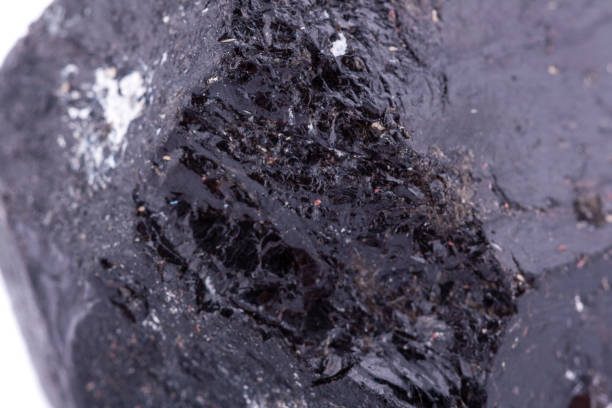 istock macro mineral stone schorl on a white background close up 1033921162