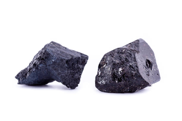 istock macro mineral stone schorl on a white background close up 1033921250
