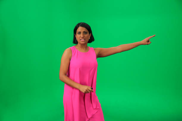 istock Weather forecaster on green background 1033921562