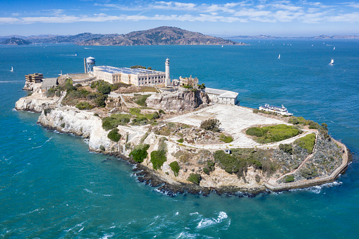Aerial of the famous Island Alcatraz by San Francisco in front of the Golden Gate Bridge. California, USA. Converted from RAW.