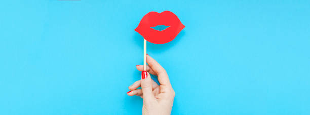 istock Red paper photo booth props female lips 1033931126